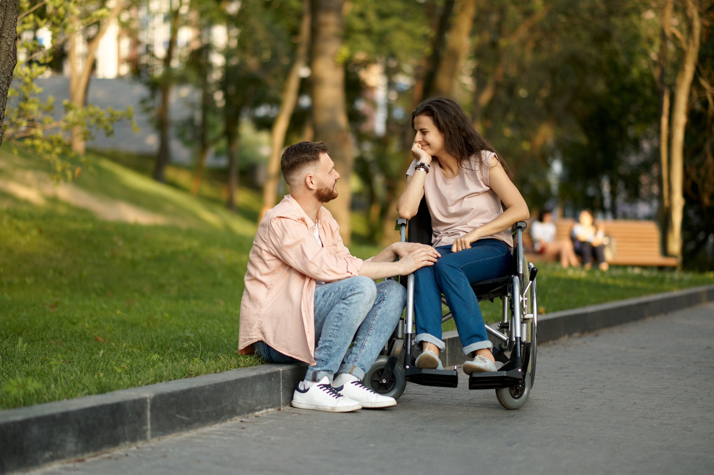 Couple with Wheelchair in Park, Disabled Woman
